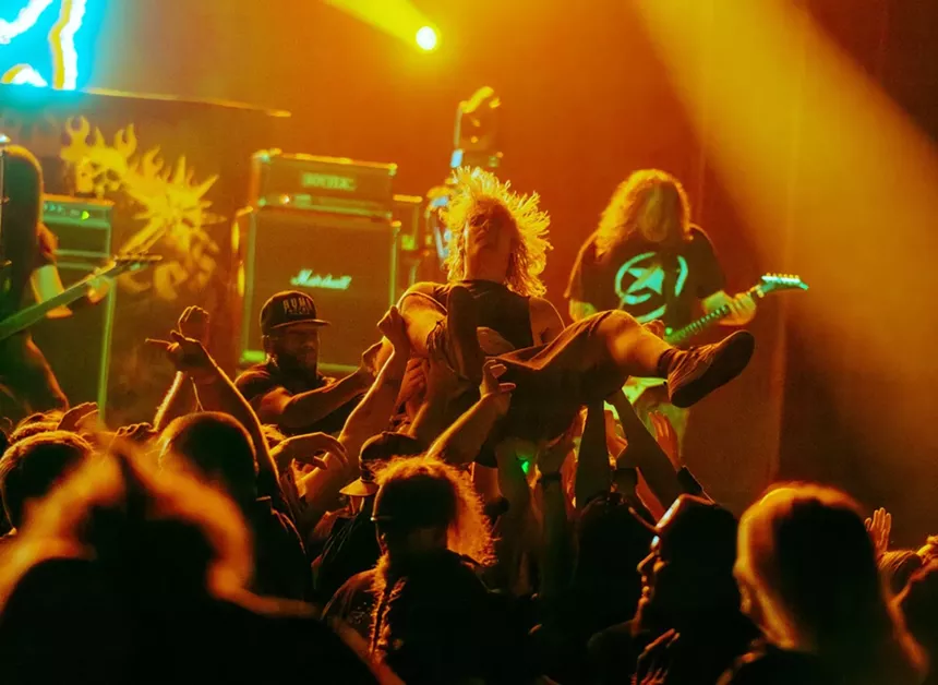 Metal band playing on stage