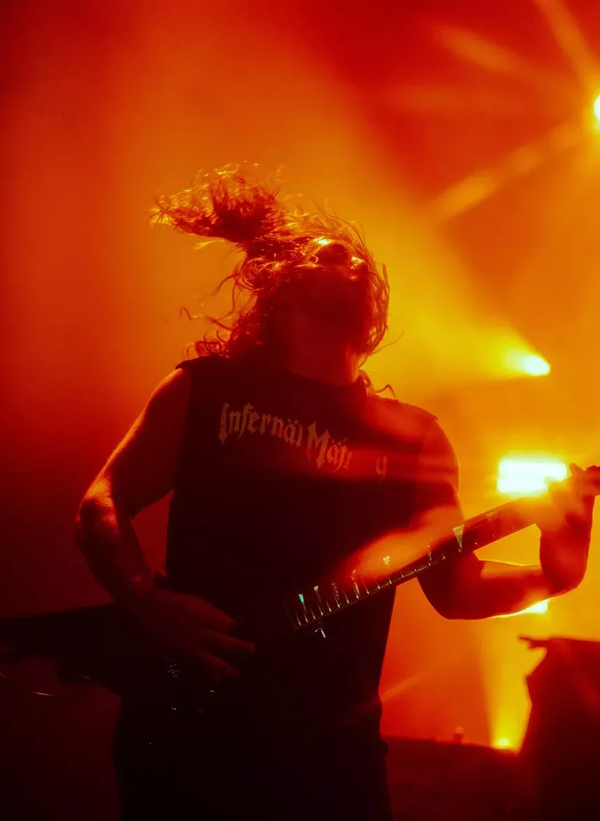 Metal band playing on stage