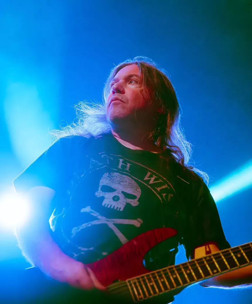 Metal band playing on stage