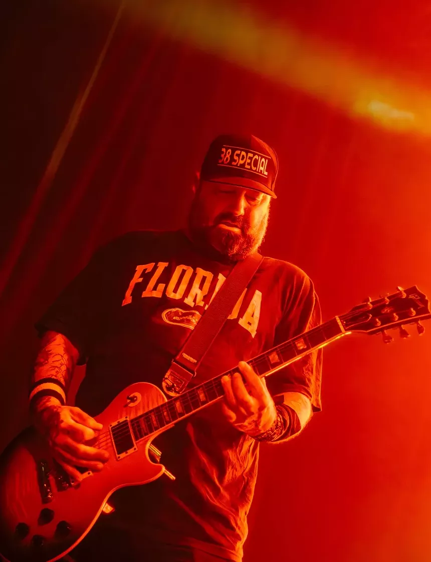 Metal band playing on stage