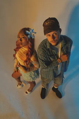 Two people posing