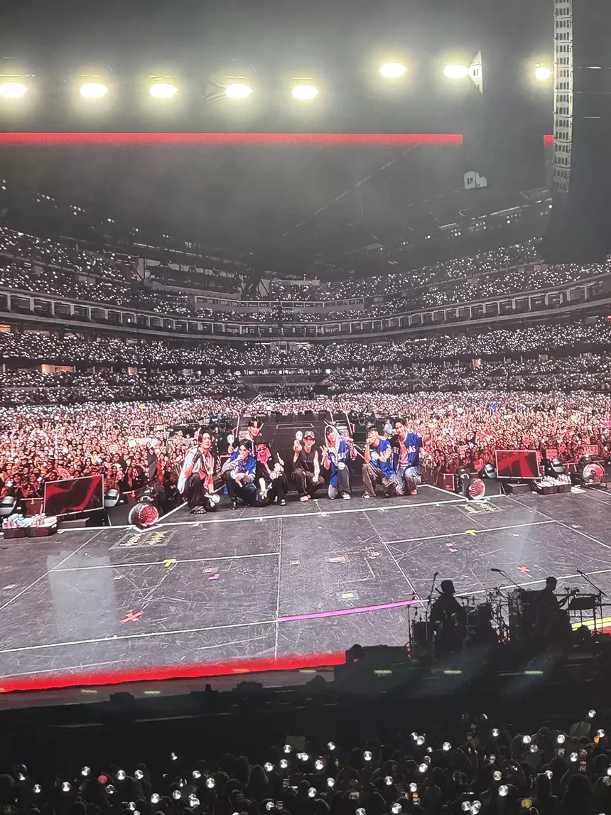 Band taking a photo on stage
