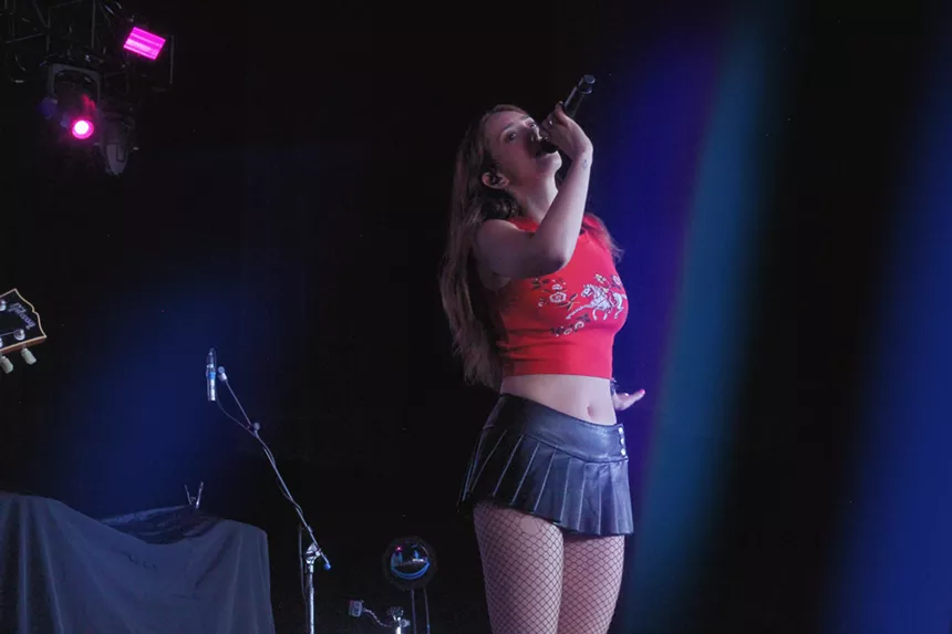 Woman performing on stage