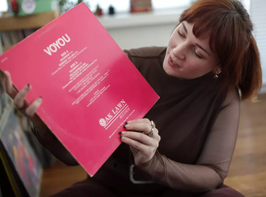 Woman showing off vinyl