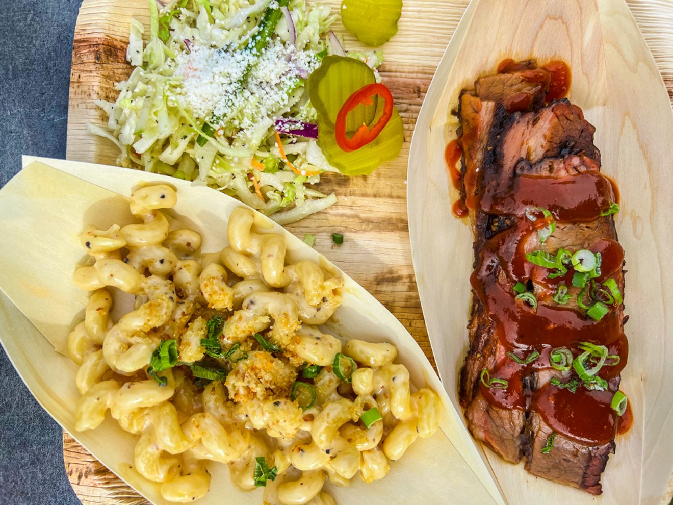 Succulent brisket and savory smoked gouda mac will make your taste buds happy.