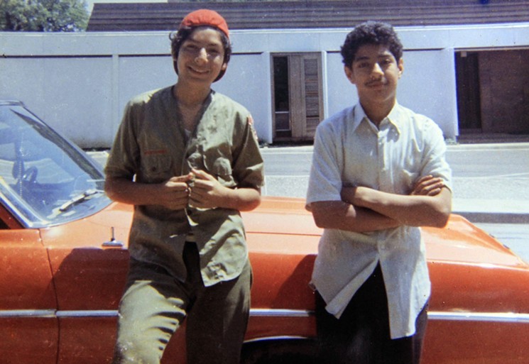 Pictured is David Rodriguez, 13, and his brother Santos in 1973, only months before Santos was murdered by a Dallas police officer.