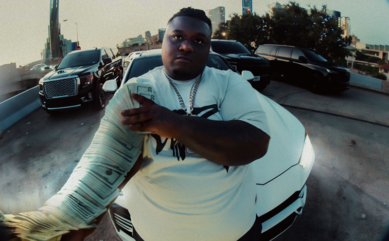 Image: Watch HeadHuncho Amir Eat Rudy's Chicken and Hit Up SMU in 'New Dallus' Video