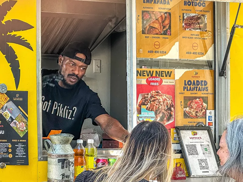 Image: Adisson serves another satisfied customer.