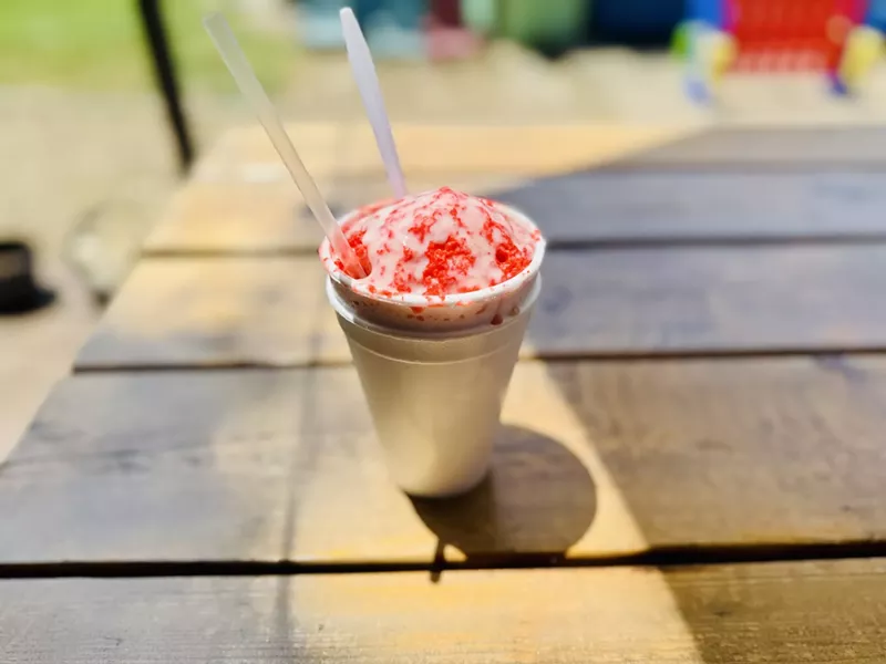 Image: Strawberry cheesecake snow ball stuffed with cheesecake and topped with Cajun creme. Yes, you read that correctly.