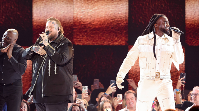 Two guys performing on stage