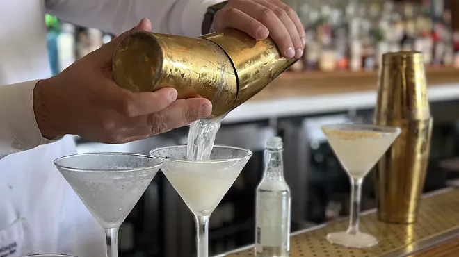 martinis being made at a bar