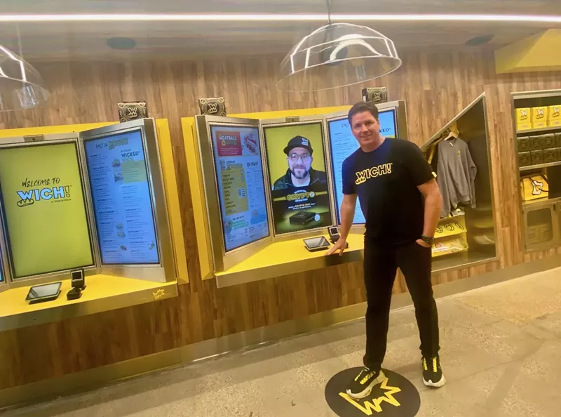 Image: Step up to the black dot on the floor to place your order.
