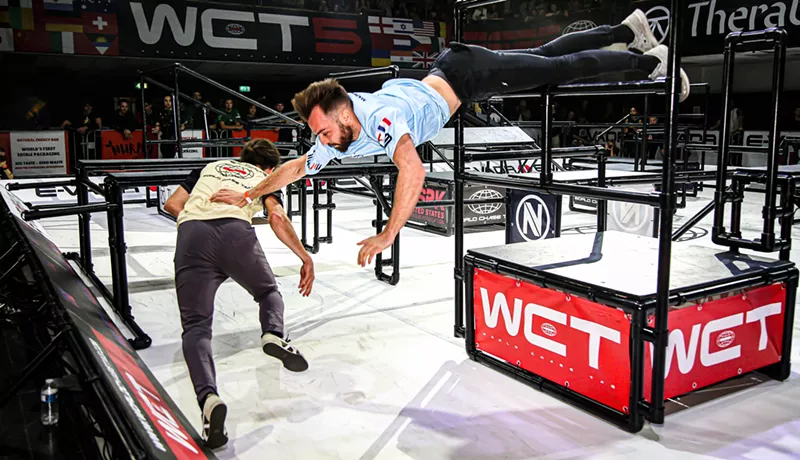 Image: Clément Dumais of United, top, captures Devin Strehle of Apex Doge in a round of World Chase Tag.