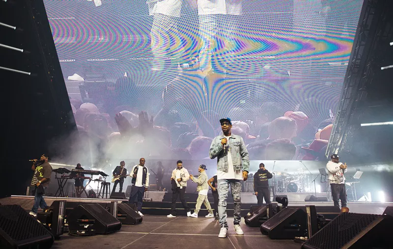 Image: A group of men on stage