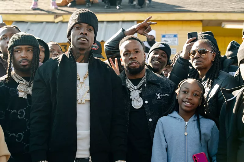 Image: A photo of two rappers